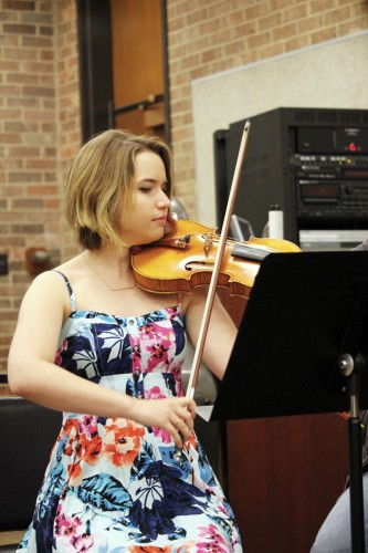 Katherine Baloff rehearses with Mux Quartet, an ensemble of fellow School of Music students. The group will likely break up after graduation. (Kirsten Onsgard / The DePaulia)