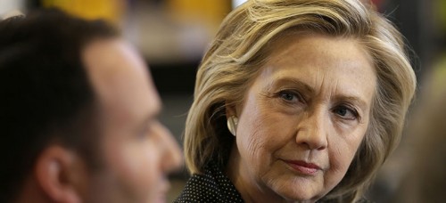 Democratic presidential candidate Hillary Rodham Clinton listens to Brad Magg, owner of Goldie’s Ice Cream Shoppe and Magg Family Catering, as she meets with small business owners,Tuesday, May 19, 2015, at the Bike Tech cycling shop in Cedar Falls, Iowa. (AP Photo/Charlie Neibergall)