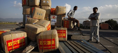 Boxes of aid from the Chinese Red Cross arrive in Nepal. (AP Photo/Niranjan Shrestha)