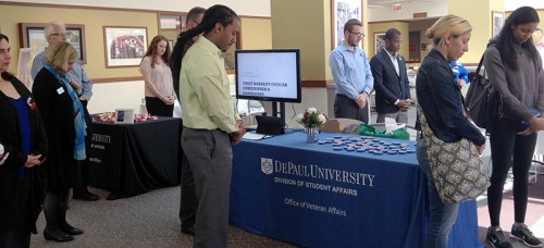 Attendees to the Memorial Day event in the DePaul Center Thursday have a moment of silence to remember soldiers who have served. (Luisa Fuentes / The DePaulia)