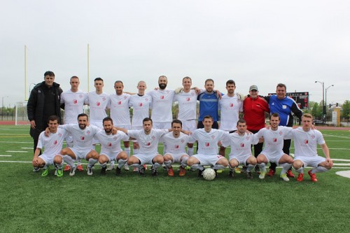 The team poses before their first match of the 2015 season, their first in the Great Lakes Premier League May 10. They won in a 4-0 drubbing in their first new league match. (Photo courtesy of RWB Adria)