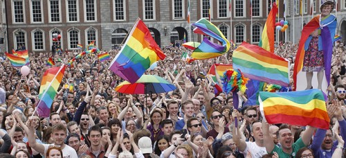 'Yes' supporters celebrate the results of the referendum in Ireland. (AP Photo/Peter Morrison)