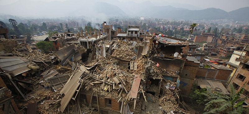 Rescue workers remove debris as they search for victims of an earthquake in Bhaktapur, Nepal. (AP Photo/Niranjan Shrestha, File)