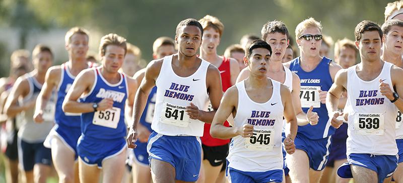 DePaul freshman Jeremy Lozano (No.  541) runs in a pack with his DePaul teammates. Lozano shaved 15 seconds off of his mile time last summer. (Photo courtesy of DePaul Athletics)