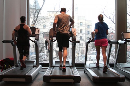 DePaul alumni and students run during an indoor triathalon last January at the Ray Meyer Fitness and Recreaton Center. (Megan Deppen / The DePaulia)