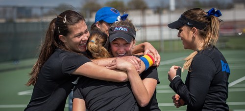 DePaul women’s tennis celebrates after winning their second straight Big East championship in New York. (Photo courtesy of DePaul Athletics)