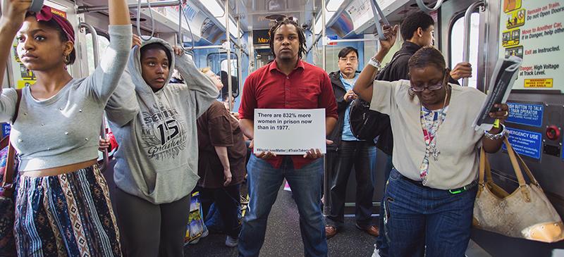 People from DePaul joined the larger Chicago community to engage in a Train Takeover protest on Friday, May 15, highlighting issues about African-American and civil rights. (Olivia Jepson / The DePaulia)