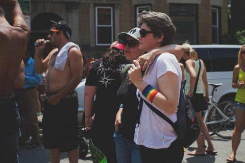 Supporters of same-sex marriage and LGBTQ advocates celebrate at the Chicago Pride Parade June 28. Some conservative religious leaders now fear losing their tax-exempt status after the Supreme Court's decision to legalize same-sex marraige. (Olivia Jepson / The DePaulia)