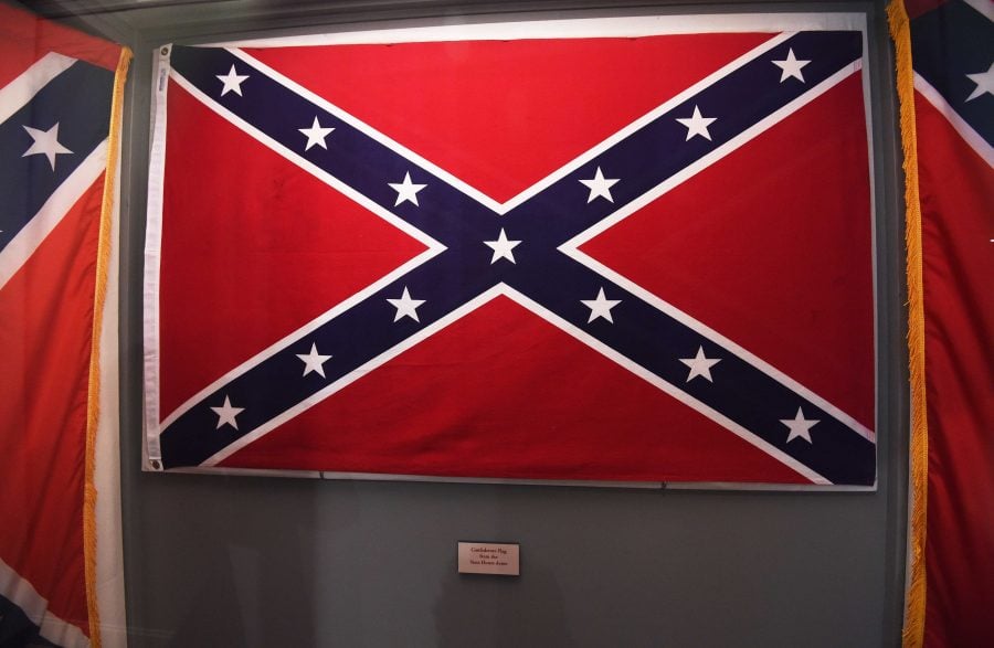 Confederate flags that once flew at the South Carolina Statehouse are displayed at the South Carolina State Museum, Wednesday, June 24, 2015, in Columbia, S.C.  (AP Photo/Rainier Ehrhardt)