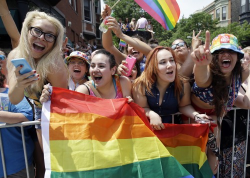 People celebrate at the 46th Annual Chicago Pride Parade, Sunday, June 28, 2015, in Chicago. A large turnout was expected for gay pride parades across the U.S. following the landmark Supreme Court ruling that said gay couples can marry anywhere in the country. (AP Photo/Nam Y. Huh)
