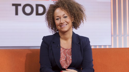 In this image released by NBC News, former NAACP leader Rachel Dolezal appears on the "Today" show set on Tuesday, June 16, 2015, in New York. Dolezal was born to two parents who say they are white, but she chooses instead to self-identify as black. Her ability to think she has a choice shows a new fluidity in race in a diversifying America, a place where the rigid racial structures that defined most of this countrys history seems, for some, to be falling to the wayside. (Anthony Quintano/NBC News via AP)