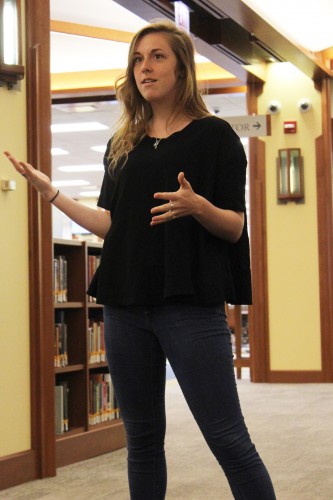 Junior Raika Nuñez leads a tour group of prospective students into the John T. Richardson Library. Along with orientation groups, campus tours are some of the busiest activities at DePaul over the summer months. (Kirsten Onsgard / The DePaulia)