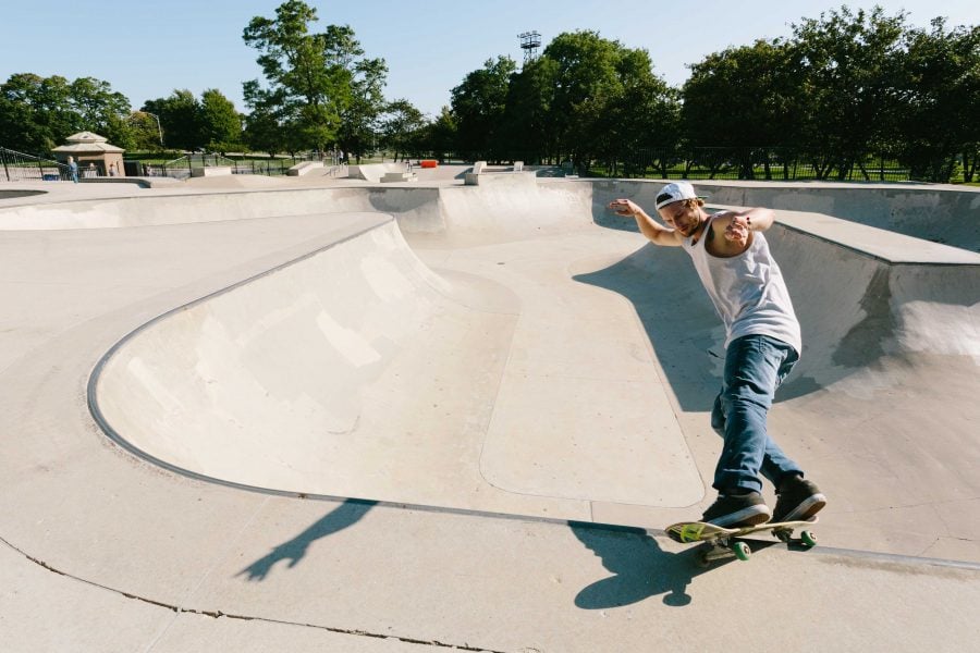 Skateboarders at Wilson Skate Park practice their tricks on the obstacles and concrete structures for skaters.