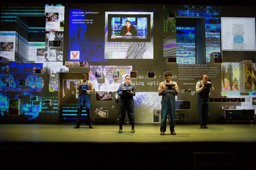 Tyrone Phillips, Elizabeth Birnkrant, Adam Poss and Dennis Grimes in Steppenwolf Theatre's "1984." (Photo courtesy of STEPPENWOLF THEATRE)