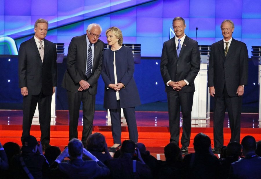 Democratic presidential candidates from left, former Virginia Sen. Jim Webb, Sen. Bernie Sanders, of Vermont, Hillary Rodham Clinton, former Maryland Gov. Martin O'Malley, and former Rhode Island Gov. Lincoln Chafee take the stage before the CNN Democratic presidential debate Tuesday, Oct. 13, 2015, in Las Vegas. (AP Photo/John Locher)