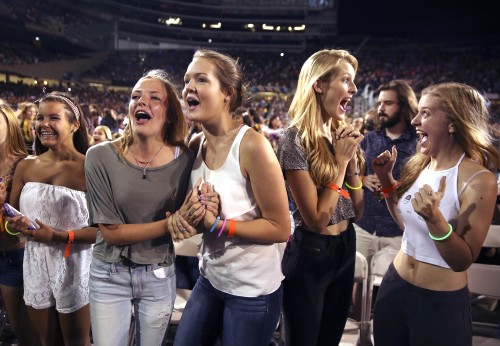 Fans get excited before the performance by One Direction at Soldier Field in Chicago on Sunday, Aug. 23, 2015. (Nuccio DiNuzzo/Chicago Tribune/TNS)