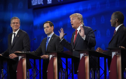 Donald Trump, second from right, speaks as Jeb Bush, left, Marco Rubio, second from left, and Ben Carson look on during the CNBC Republican presidential debate at the University of Colorado, Wednesday, Oct. 28, 2015, in Boulder, Colo. (AP Photo/Mark J. Terrill)