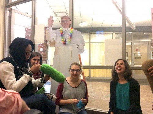 DePaul students Sarah Novosel, Jackie Posek and Elise de Bie speak to new director of Catholic Campus Ministry Amanda Thompson. (Yazmin Dominguez / The DePaulia)