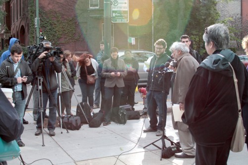 Reporters and members of the DePaul community listen Thursday morning as Northwestern University professor and past president of the Division of psychoanalysis in the American Psychological Association Dr. Frank Summers makes his case for why Dr. Gerald Koocher should be stripped of his deanship over the College of Science and Health. (Megan Deppen / The DePaulia)