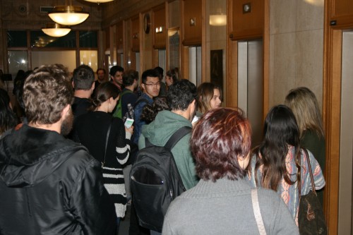 Students wait for an available elevator in the Lewis Center. The building is one of many at DePaul with elevator renovations taking place, leading to congestion during peak hours. (Mariah Woelfel / The DePaulia)