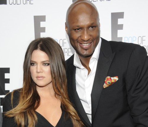 FILE - In this April 30, 2012, file photo, Khloe Kardashian Odom and Lamar Odom from the show "Keeping Up With The Kardashians" attend an E! Network upfront event at Gotham Hall in New York. A family representative says Lamar Odom has left a Las Vegas hospital and is now in the Los Angeles area to continue his recovery a week after being found unconscious at a Nevada brothel. Alvina Alston, publicist for Odom's aunt JaNean Mercer, said Tuesday, oct. 20, 2015, that the former NBA star was transported by helicopter from Sunrise Hospital and Medical Center in Las Vegas around 5 p.m. Monday. (AP Photo/Evan Agostini, File)