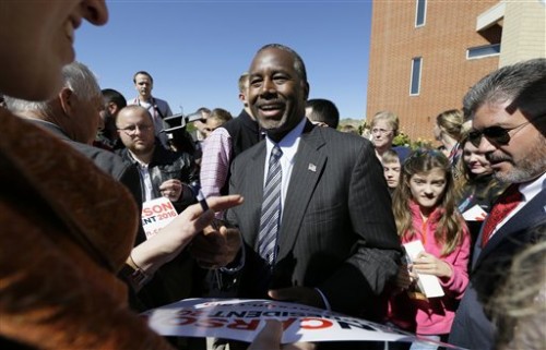 Republican presidential candidate Dr. Ben Carson greets audience members following a town hall meeting, Friday, Oct. 2, 2015, in Ankeny, Iowa. (AP Photo/Charlie Neibergall)