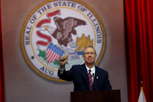 Gov. Bruce Rauner gives a thumbs up after giving his first speech as governor on Monday Jan. 12, 2015 at the Prairie Capital Convention Center in Springfield, Ill. (Nancy Stone/Chicago Tribune/TNS)