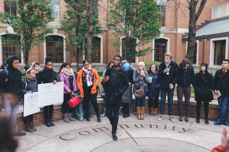 Elijah Obasanya, president of MOVE, asks students to reflect on racial inequality not only at Mizzou, but also at DePaul Thursday. (Josh Leff / The DePaulia)