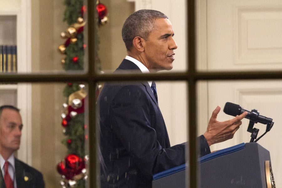 President Barack Obama addresses the nation from the Oval Office at the White House in Washington, Sunday night, Dec. 6, 2016.  The president's speech followed Wednesday's shooting in San Bernardino, California, that killed 14 people and wounded 21.  (AP Photo/Jacquelyn Martin)