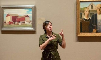 A guide leads a tour in sign language. (Photo courtesy of The Art Institute of Chicago.) 