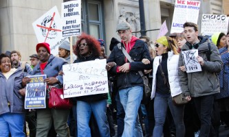 Protesters march through the Loop calling for Chicago Mayor Rahm Emanuel's resignation Wednesday. (Kirsten Onsgard / The DePaulia)