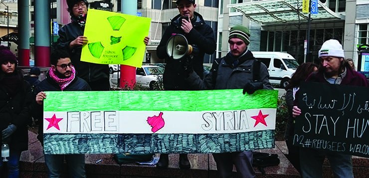 Syrian students rally for refugee acceptance