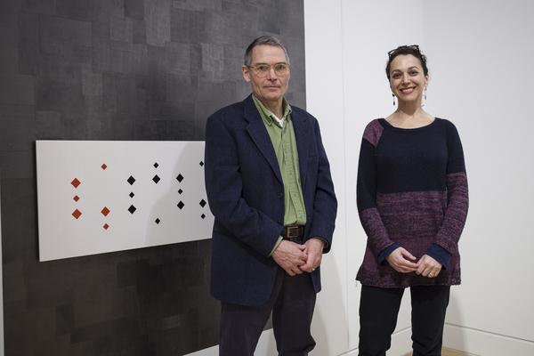 Artists Richard Rezac, left, and Dianna Frid with one of their sculptures from their exhibit Dianna Frid & Richard Rezac: Split Complementary Monday, Jan. 25, 2016, at the DePaul Art Museum. Dianna Frid and Richard Rezac: Split Complementary brings together recent works by both artists that are displayed alongside rare books from the Special Collections of DePaul Universitys John T. Richardson Library and a variety of objects from the DePaul Art Museums permanent collection. The juxtaposition of objects made by artists, craftspeople, and bookbinders generates affinities that broaden how we see and understand all of the work assembled. (DePaul University/Michael McAfee)