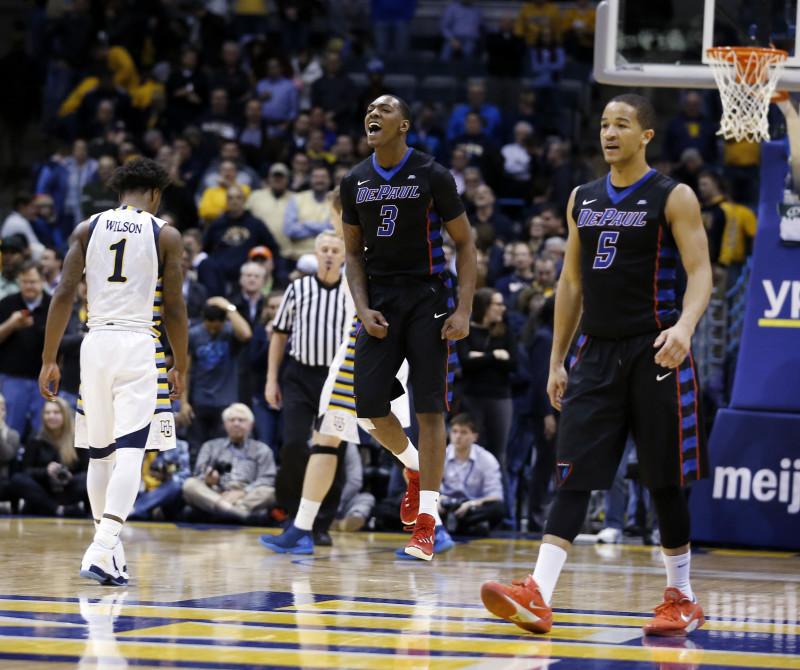 DePaul's Rashaun Stimage (3) and Billy Garrett Jr. (5) celebrate after an NCAA college basketball game against Marquette Wednesday, Jan. 20, 2016, in Milwaukee. DePaul won 57-56. (AP Photo/Morry Gash)