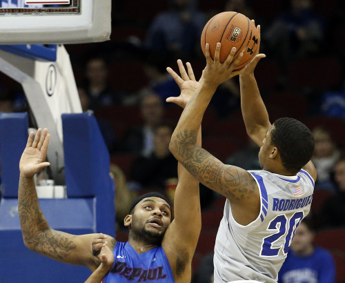 Seton Hall forward Desi Rodriguez (20) goes up for a shot against DePaul center Tommy Hamilton IV (2) during the first half of an NCAA college basketball game, Saturday, Jan. 2, 2016, in Newark, N.J. (AP Photo/Julio Cortez)