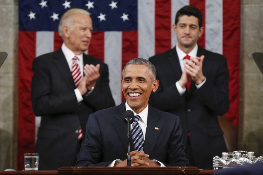 Vice President Joe Biden, left, and House Speaker Paul Ryan of Wisconsin applaud President Barack Obama during the State of the Union address before a joint session of Congress on Capitol Hill in Washington, Tuesday, Jan. 12, 2016. (AP Photo/Evan Vucci, Pool)