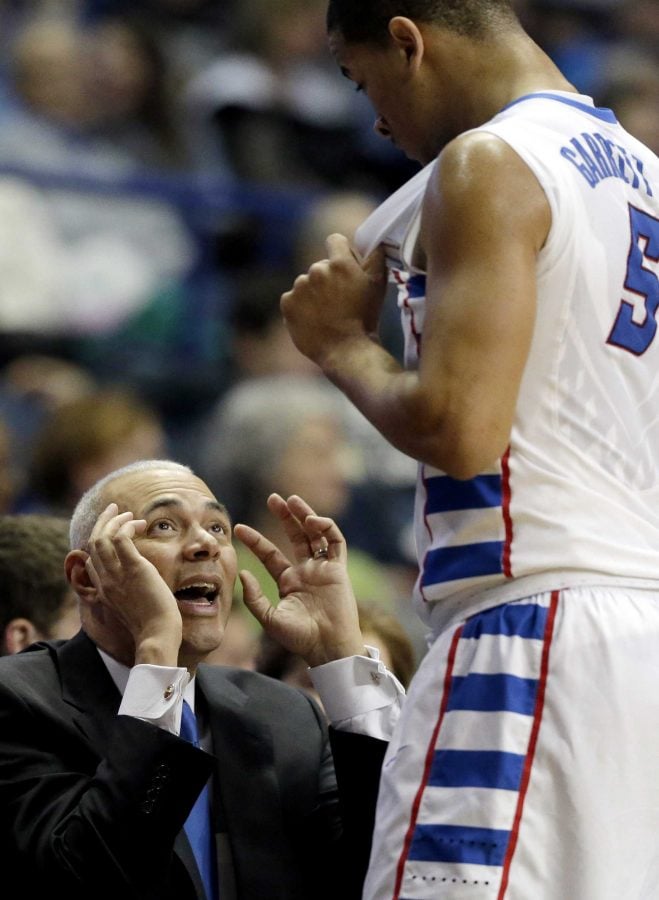 Xavier head coach Dave Leitao, left, talks to guard Billy Garrett Jr., during the second half of an NCAA college basketball game against DePaul, Saturday, Jan. 30, 2016, in Rosemont, Ill. Xavier won 86-65. (AP Photo/Nam Y. Huh)