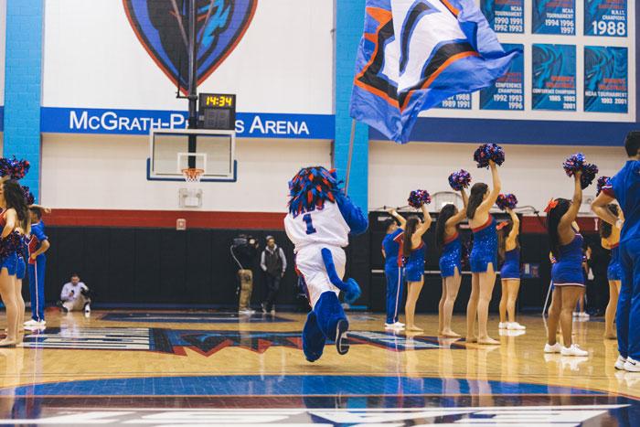 Dibs carries the Blue Demon flag with pride during the women’s basketball game last week. There was a slight rise in school spirit last week with Blue Demon Week. (Josh Leff / The DePaulia)