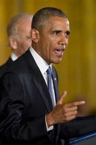 His cheeks wet with tears, President Barack Obama, accompanied by Vice President Joe Biden, speaks about the youngest victims of the Sandy Hook shootings, Tuesday, Jan. 5, 2016, in the East Room of the White House in Washington, where he spoke about steps his administration is taking to reduce gun violence. (AP Photo/Jacquelyn Martin)