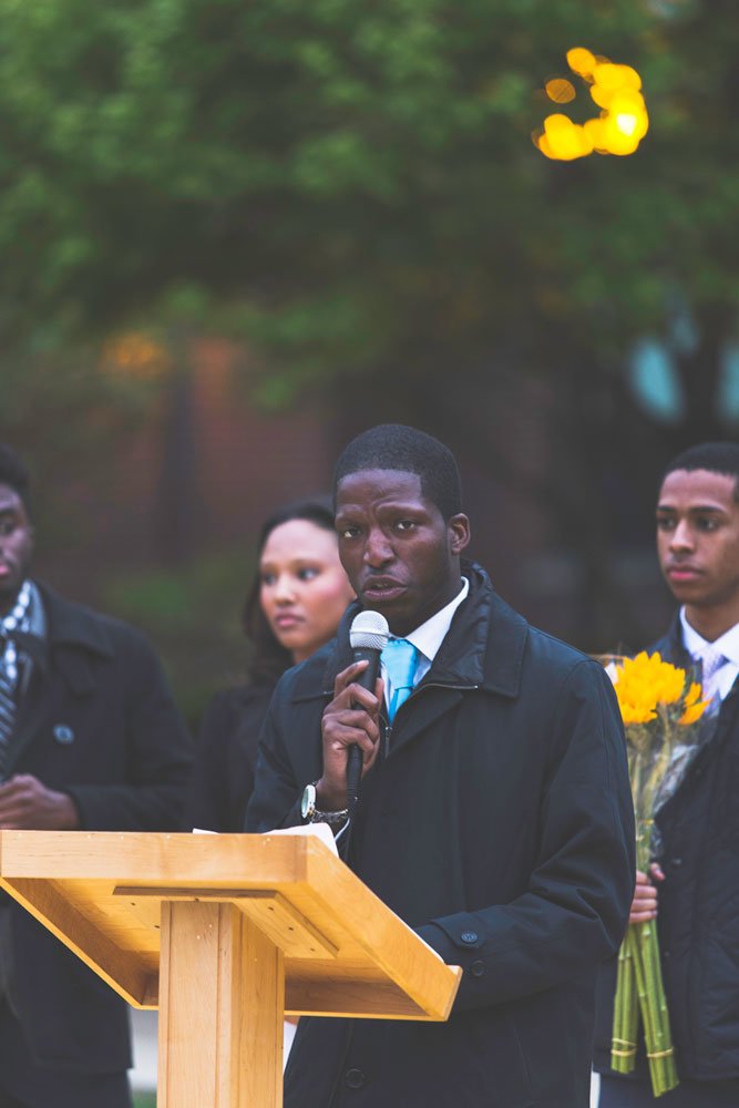 DePaul student Edward Ward speaks at an on-campus vigil. Ward’s eventual goal is to run for office. (Josh Leff / The DePaulia)