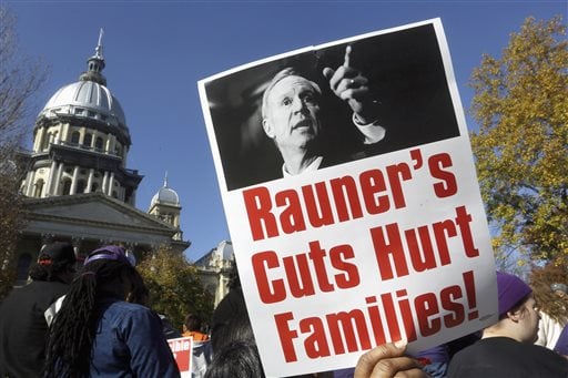FILE - In this Nov. 10, 2015 file photo, protesters rally in support of lawmakers ending the state budget impasse at the Illinois state Capitol in Springfield. Gov. Bruce Rauner takes pride in not being like any of Illinois previous governors. Unlike even his Republican predecessors, who often cut deals with Democrats and their labor union allies in the Legislature, Rauner brags about being the first to stand up to them, even as its led to a record-breaking stalemate. Seven months after Illinois last state budget expired, it still doesnt have a new one. (AP Photo/Seth Perlman, File)