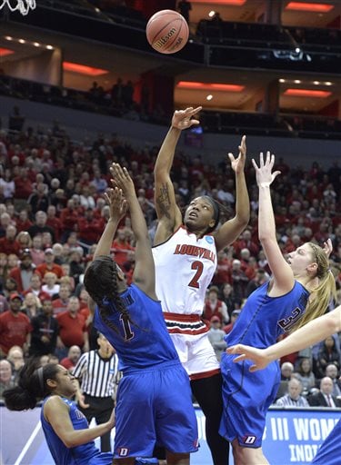 Louisville's Myisha Hines-Allen (2) charges before taking the possible winning shot against the defense of, from left, DePaul's Chanise Jenkins (13), Ashton Millender (1), and Megan Podkowa (30) during the second half of a second-round women's college basketball game in the NCAA Tournament in Louisville, Ky., Sunday, March 20, 2016. (AP Photo/Timothy D. Easley)