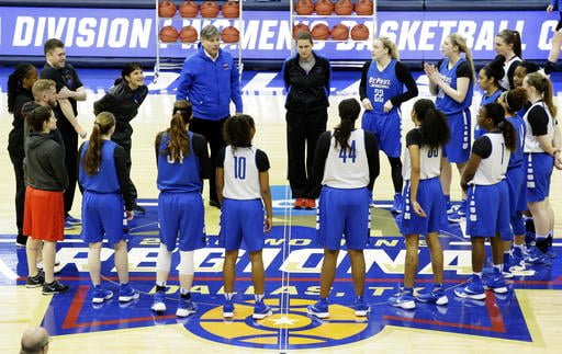 The DePaul team gathers at mid court at the start of a college basketball practice in the regional semifinals of the women's NCAA Tournament Friday, March 25, 2016, in Dallas, Texas. (Photo courtesy of LM Otero / ASSOCIATED PRESS)
