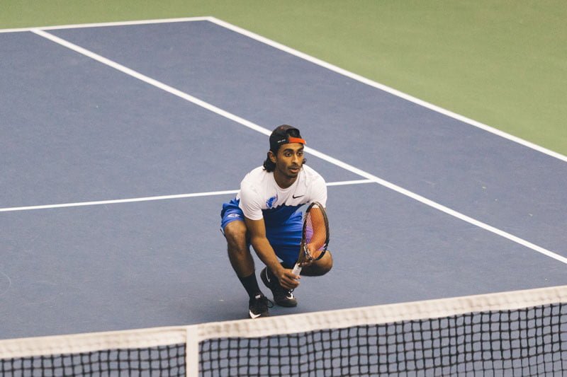 Senior Paul John won a crucial singles point, helping DePaul win. (Josh Leff / The DePaulia)