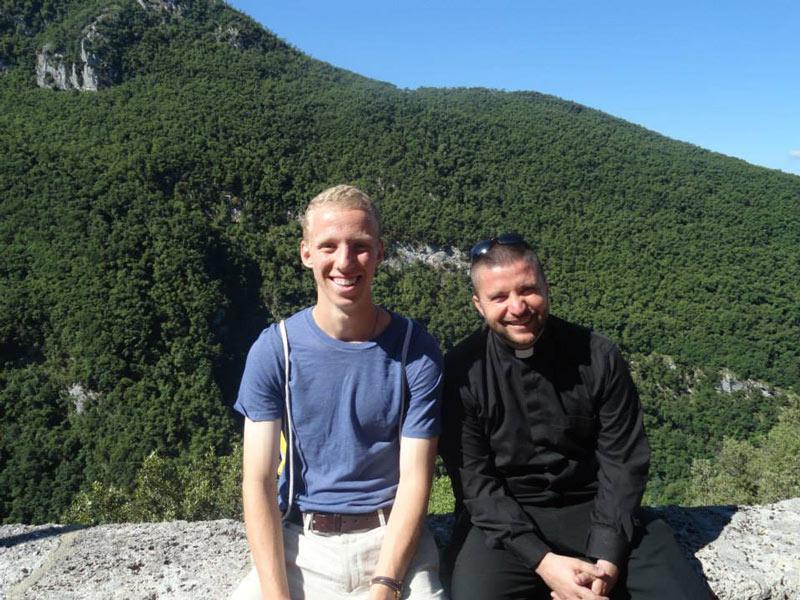 DePaul sophomore Ryan Martire sits with the Rev. Joshua Waltz in Subiaco, Italy. Waltz encouraged Martire to go to daily Mass, which played a large role in his faith.  (Photo courtesy of Ryan Martire)