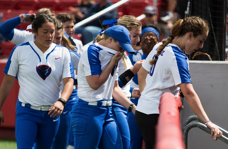 The team enters the dugout following their 10-6 loss to Butler. (Geoff Stellfox/The DePaulia)