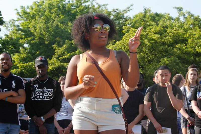 Charia McDonald speaks to students gathered in the quad during a rally countering Milo Yiannopoulos' speech at DePaul. (Kirsten Onsgard / The DePaulia)