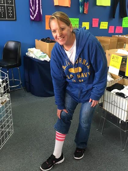 Kim Castle, owner of The Socks Shoppe, shows off her striped pair. (Jeramie Bizzle / The DePaulia)