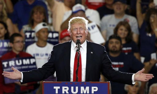 FILE - In this May 24, 2016 file photo, Republican presidential candidate Donald Trump speaks at a campaign event in Albuquerque, N.M. According to an AP count: Trump has reached the number of delegates needed to clinch the Republican nomination for president. Trump, the only remaining GOP candidate left in the race, will go on to accept the nomination at the partys national convention in Cleveland. (AP Photo/Brennan Linsley, File)