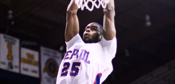 Former DePaul player Eric Wallace moves from the court to the gridiron